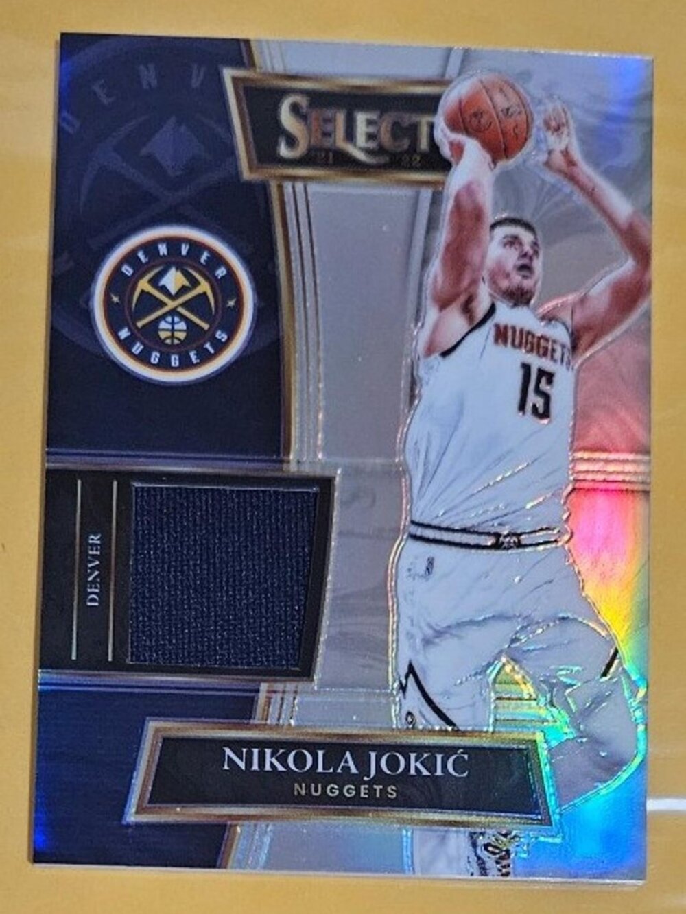 2021-22 Panini Select Nikola Jokić Selective Swatches Silver Prism # SS-NJK Mint